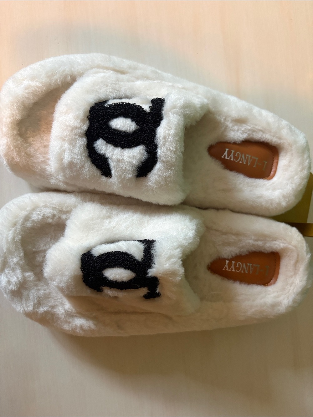 L-Fancy Women's White Fuzzy Slide Slippers with Black Logo